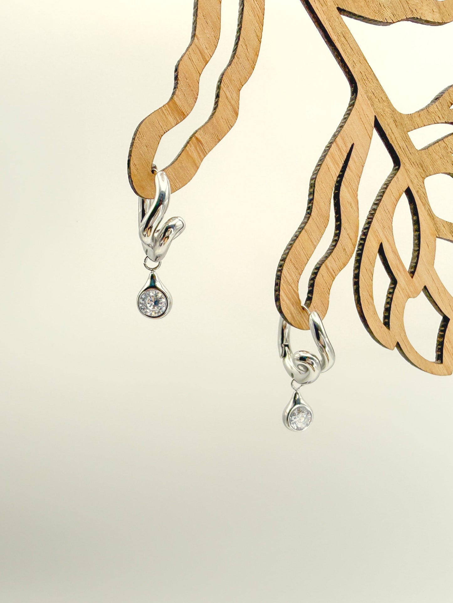 Daliah Twist Huggies and CZ Earrings