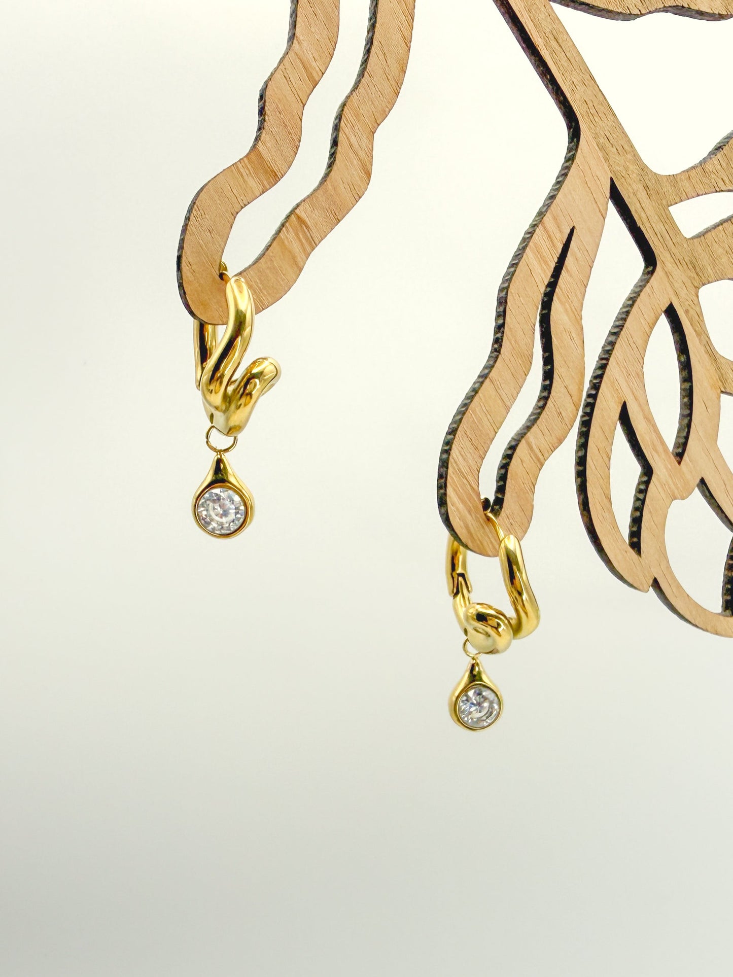 Daliah Twist Huggies and CZ Earrings